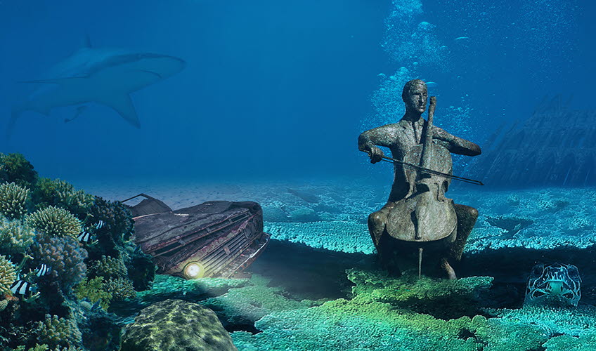 Man som spelar cello under vatten
